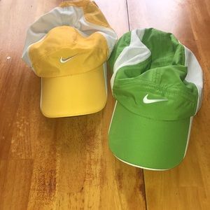Two Nike hats for $15. Both never worn.